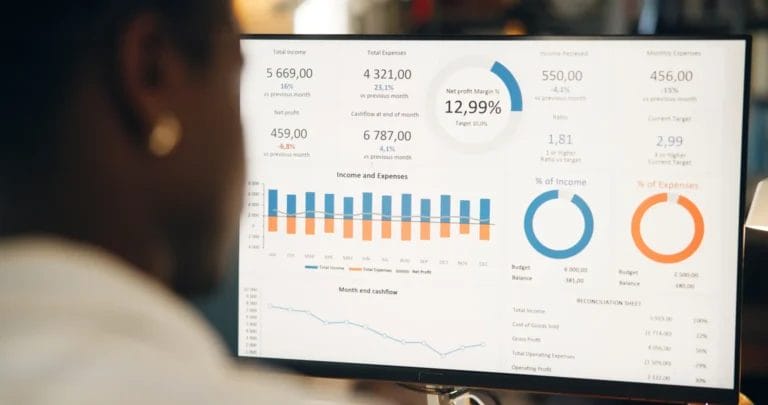 business man using what is lead management tool to keep track of potential clients and sales