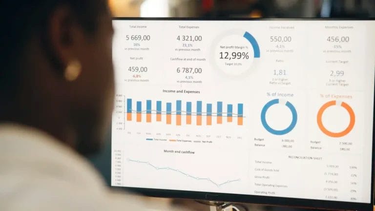 Business man using what is lead management tool to keep track of potential clients and sales