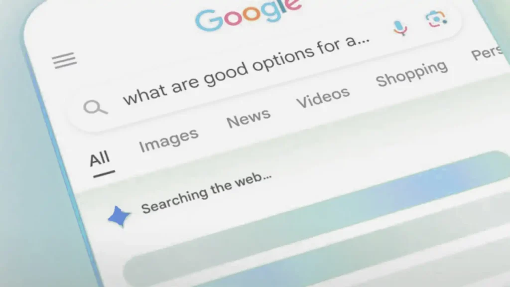 Close-up of a smartphone screen displaying a Google search in progress with the partially typed query 'what are good options for a...' and a loading AI Overview animation that reads 'Searching the web...' for results with generative engine optimization.